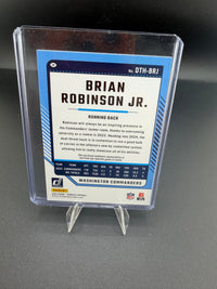 2024 Panini Donruss Threads Brian Robinson Jr. Washington Commanders Memorabilia Card DTH-BRJ - back