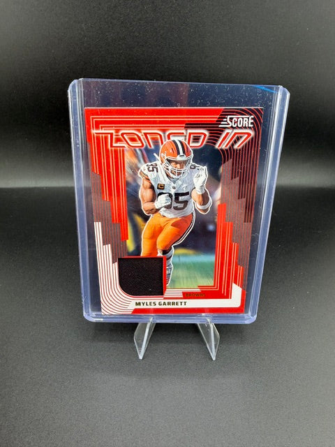 2025 Panini Score Zoned In Jerseys Myles Garrett #ZON-MGT - front