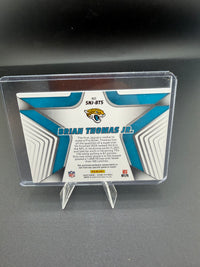 2025 Panini Score Stars of the NFL Brian Thomas Jr. Jersey Card SNJ-BTS - back