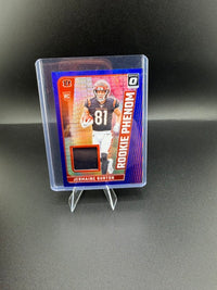 2024 Panini Donruss Optic Rookie Phenom Jermaine Burton Blue Hyper RPB-JBN Rookie Memorabilia Card - front
