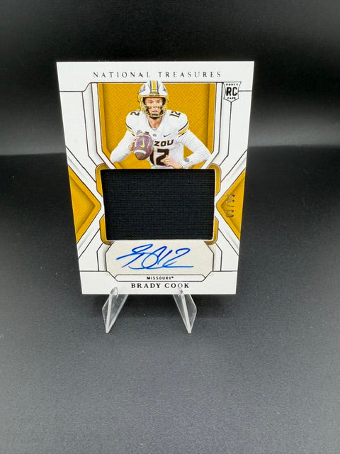 2025 Panini National Treasures Collegiate College Materials Signatures Brady Cook #81 Rookie Patch Autograph - front