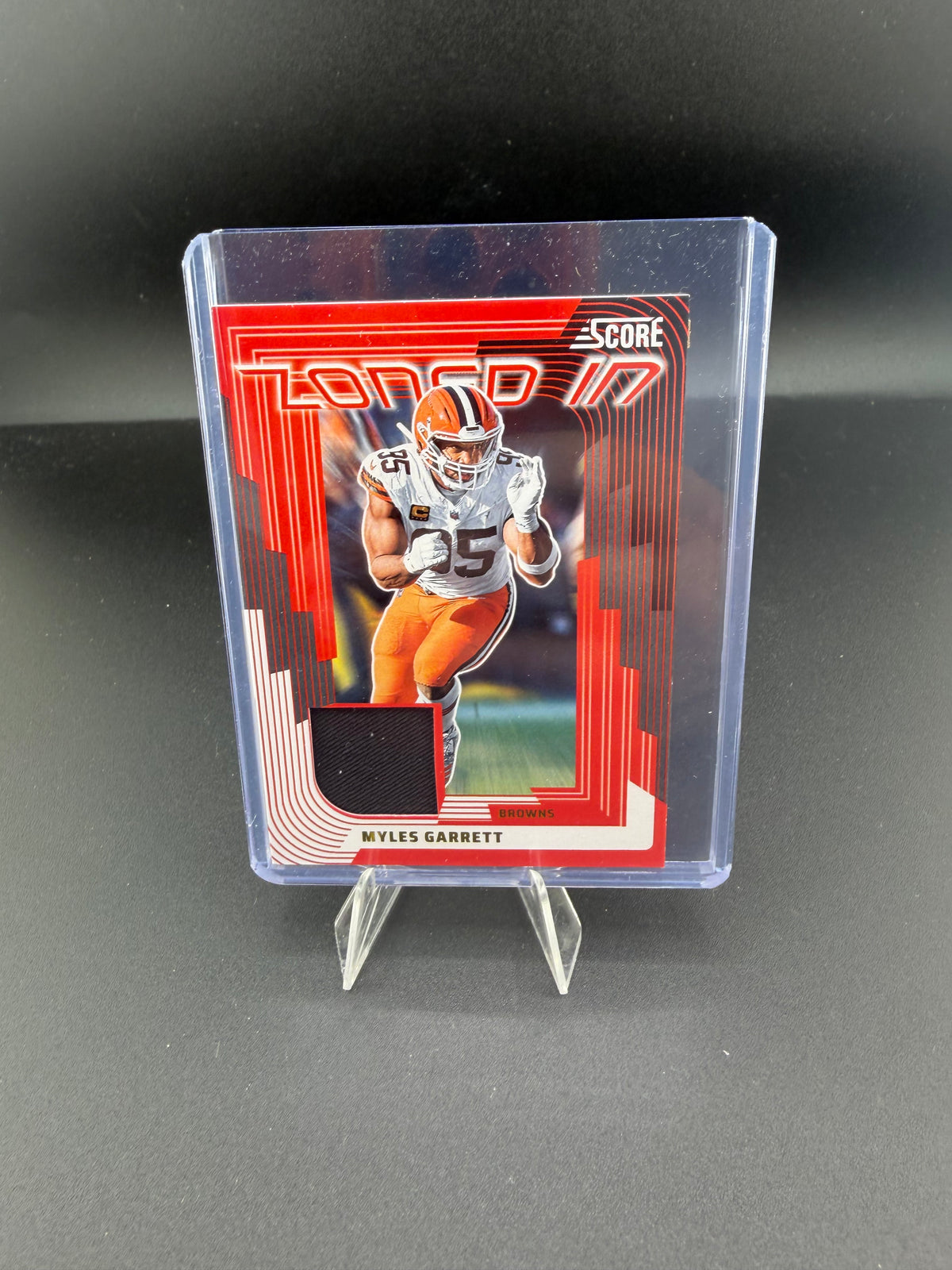 2025 Panini Score Football Zone-Mates Myles Garrett Cleveland Browns Memorabilia Card ZON-MGT - front