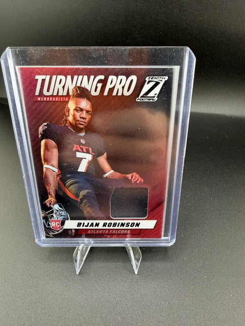 2023 Panini Zenith Football Turning Pro Memorabilia Bijan Robinson Rookie Card TPM-BRN - front