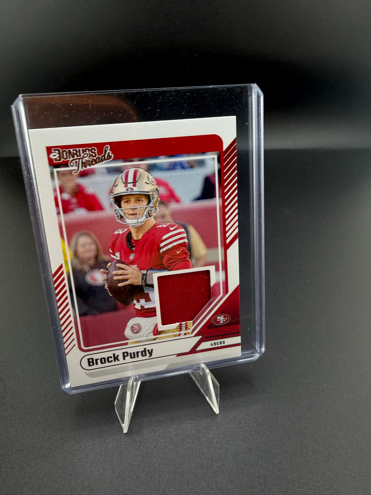 2024 Panini Donruss Threads Brock Purdy DTH-BPU San Francisco 49ers Memorabilia Card - front