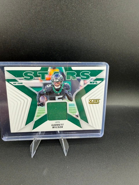 2023 Panini Score Stars of the NFL Garrett Wilson Jersey Card #SNJ-GWN - front