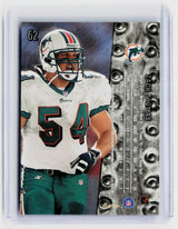 1999 SkyBox Premium #62 Zach Thomas Miami Dolphins - back