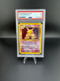 1999 Wizards Pokémon Game Alakazam Holo #1 PSA VG 3 - front