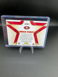 2024 Panini Score Stars of the NFL Brock Purdy Jersey #SNJ-BPY - back
