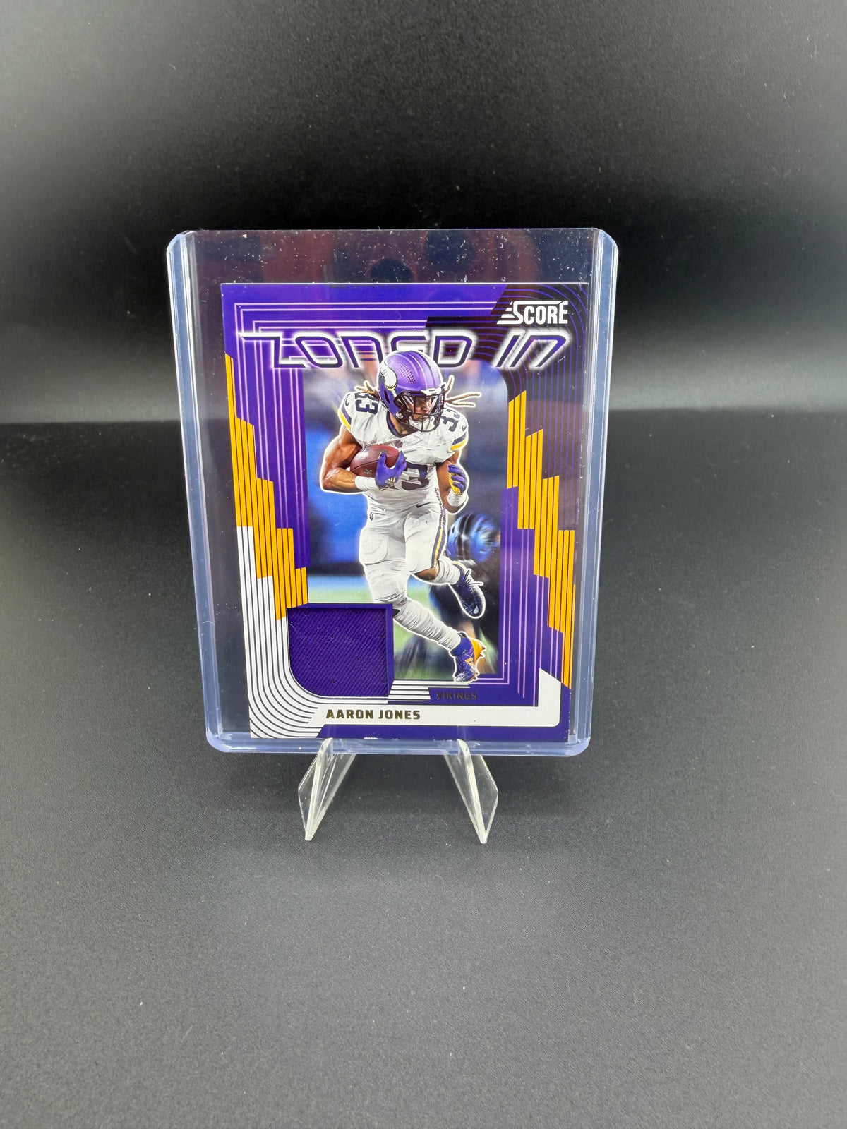 2025 Panini Score Zoned In Aaron Jones Memorabilia Card #ZON-AJ5 - front