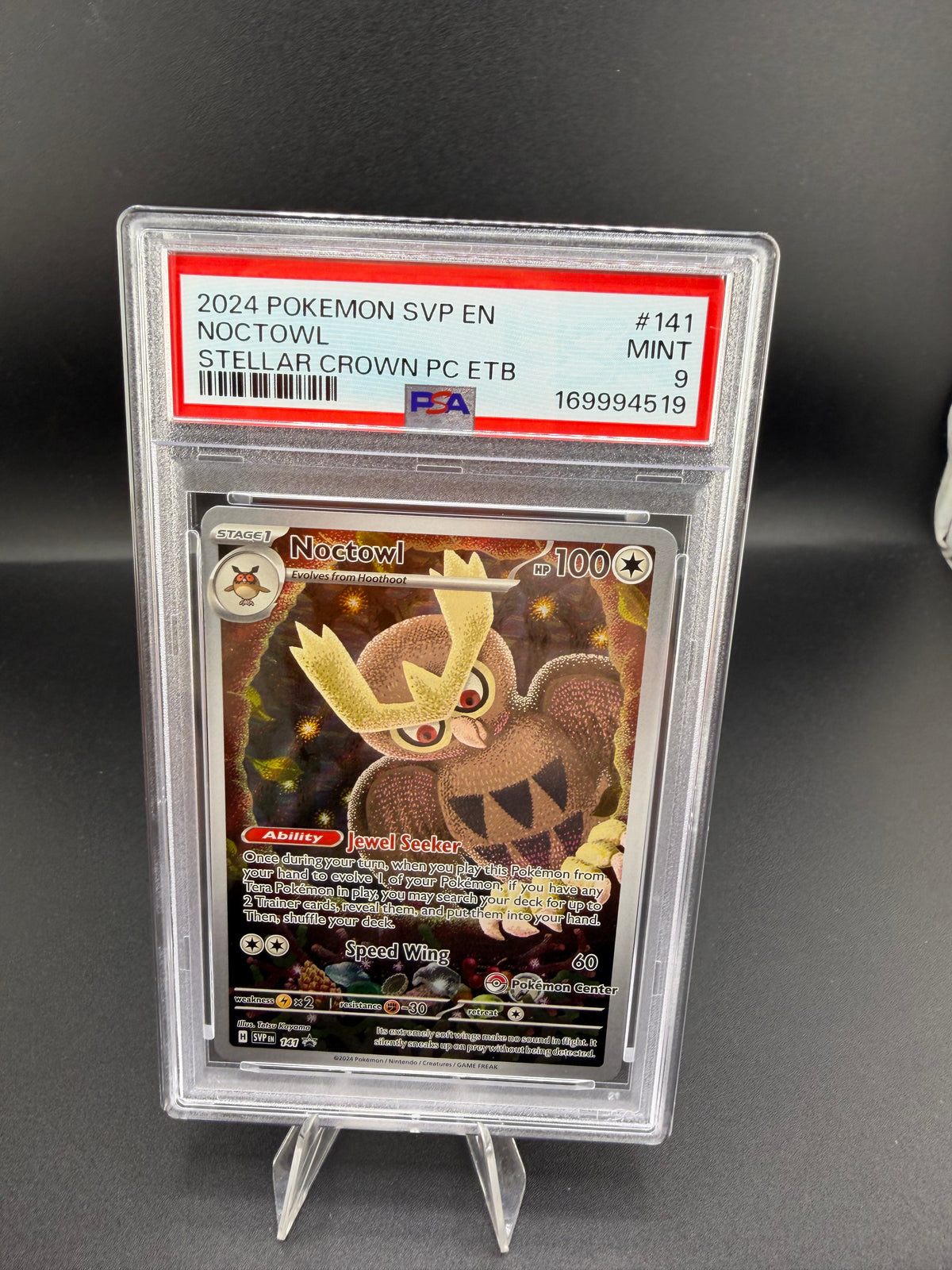 2024 Pokémon Stellar Crown Noctowl #141 Pokémon Center ETB Promo PSA 9 - front
